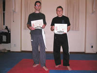 Josh and Sam with certificates and White Sashes