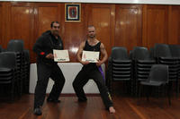 Govinder and Simon relaxing after their grading.