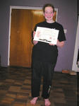 Sarah after her grading, and showing a well earned big smile!
