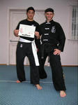 Chris - Queanbeyan Fire Dragon's new White Sash, with his Instructor Shr Zr.