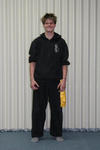 Adam (some time after his grading), and wearing his Yellow Sash comfortably