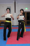 Morgan and Zi Hao, showing their certificates, and with their new sashes - and smiles!