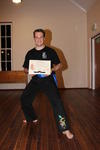 Jono, with his certificate and Blue Sash.